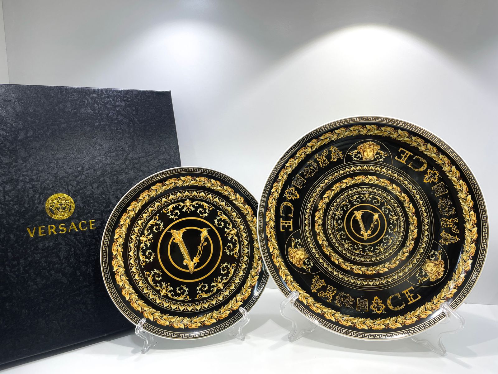 Set of two black plates from Versace